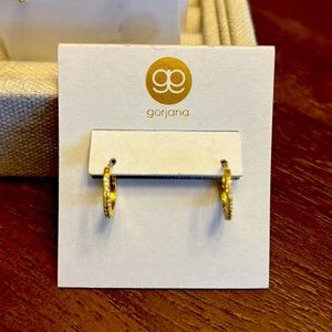 Gorjana little hoops with cz diamond look and gold metal.